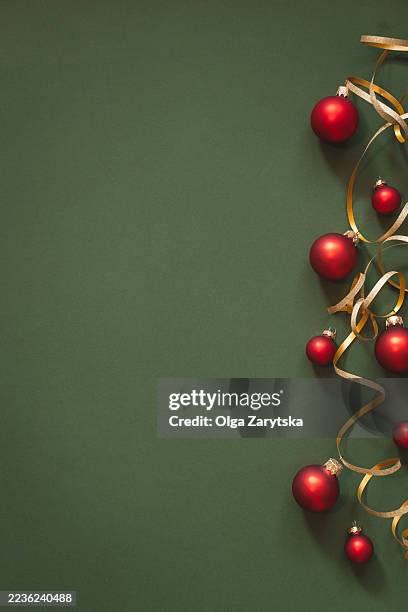 christmas background with red baubles and golden ribbons - flat lay stock pictures, royalty-free photos & images