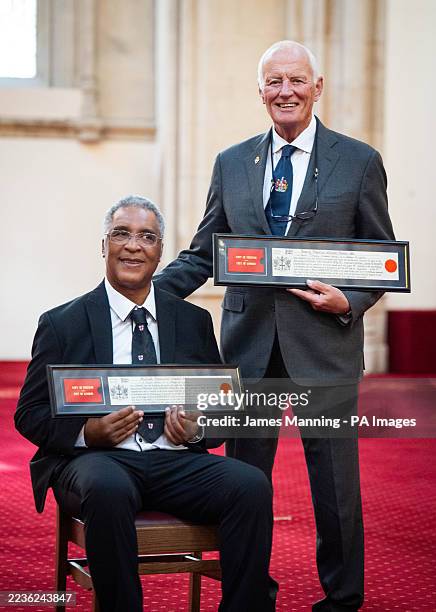 Boxer Michael Watson and boxing promoter Barry Hearn pose after they both received the Freedom of the City of London in a ceremony at the Guildhall....