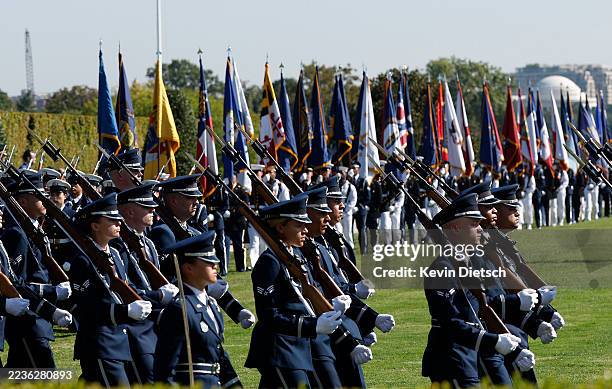 Members of a Joint Services Honor Guard perform a pass and review during the Department of War 2025 National Prisoner of POW/MIA Recognition Day...