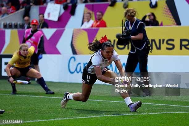 Asia Hogan-Rochester of Canada scores her team's second try during the Women's Rugby World Cup 2025 Semi Final match between New Zealand and Canada...