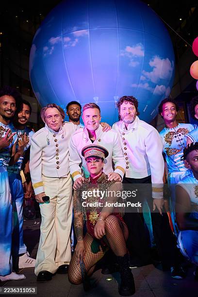 Mark Owen, Gary Barlow and Howard Donald of Take That during their performance on The One Show at BBC Broadcasting House on September 19, 2025 in...
