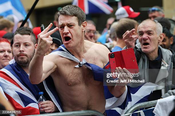 Anti migrant demonstrators attend a Far Right Unity Rally on September 20, 2025 in Glasgow, Scotland. Demonstrations in Scotland against migrants...