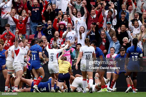 The England fans celebrate as Amy Cokayne of England scores her team's second try during the Women's Rugby World Cup 2025 Semi Final match between...