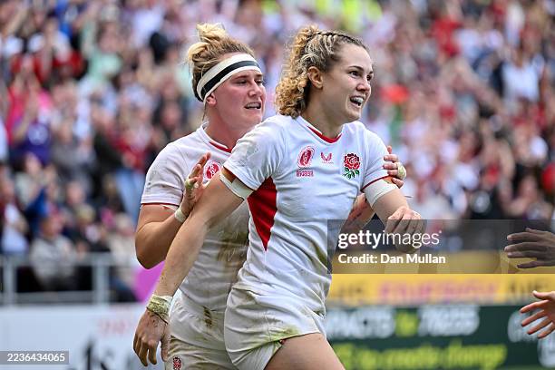Ellie Kildunne of England celebrates scoring her team's fourth try with team mate Megan Jones during the Women's Rugby World Cup 2025 Semi Final...