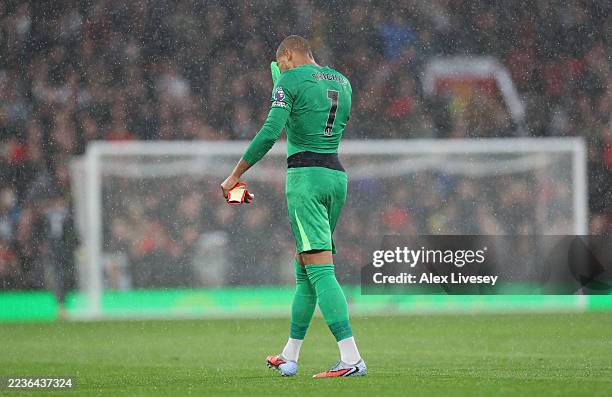 Robert Sanchez of Chelsea looks dejected after being shown a red card for a foul on Bryan Mbeumo of Manchester United during the Premier League match...