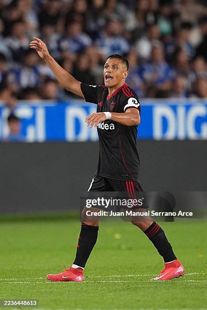Alexis Sanchez of Sevilla FC celebrates scoring his team's second goal during the LaLiga EA Sports match between Deportivo Alaves and Sevilla FC at...