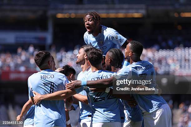 Alonso Martínez of New York City FC and teammates celebrate his second half goal against Charlotte FC at Yankee Stadium on September 20, 2025 in New...