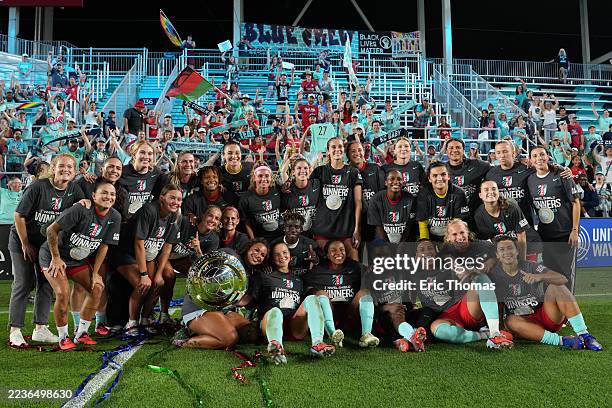 Players of Kansas City Current pose for a team photo with the Shield after winning the NWSL match between Kansas City Current and Seattle Reign at...