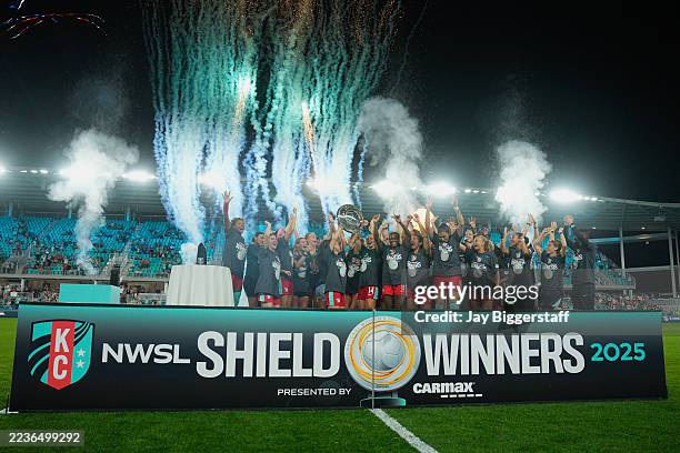 Lo'eau LaBonta of Kansas City Current lifts the Shield with teammates after winning the NWSL match between Kansas City Current and Seattle Reign at...