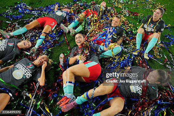 Lo'eau LaBonta of Kansas City Current and teammates celebrate after winning the Shield following the NWSL match between Kansas City Current and...