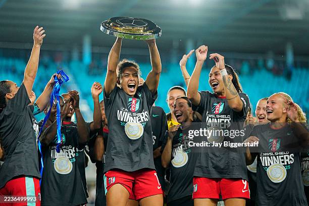 Rocky Rodríguez of Kansas City Current celebrates with the Shield after winning the NWSL match between Kansas City Current and Seattle Reign at CPKC...