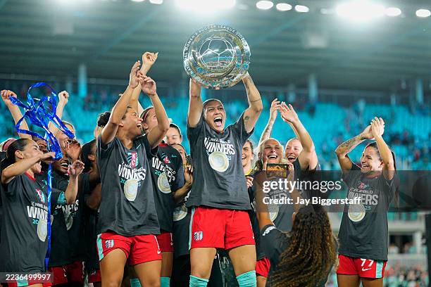 Bia Zaneratto of Kansas City Current celebrates with the Shield after winning the NWSL match between Kansas City Current and Seattle Reign at CPKC...