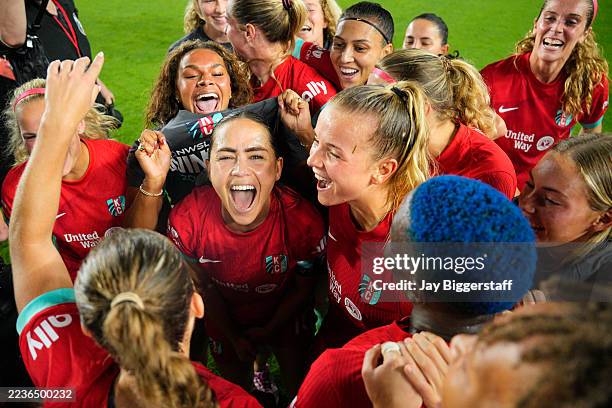 Lo'eau LaBonta of Kansas City Current and teammates celebrate after winning the Shield following the NWSL match between Kansas City Current and...