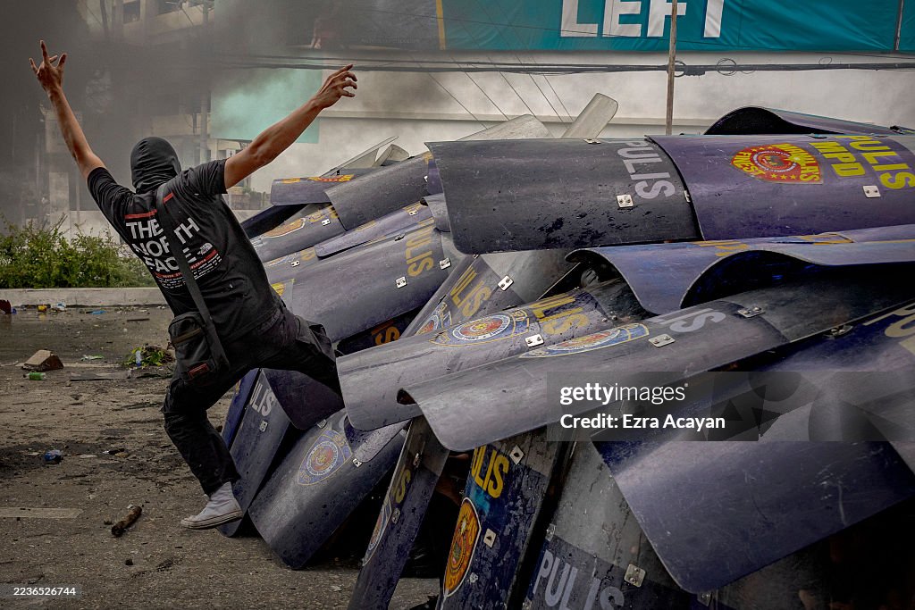 Afp Rally Red Allert Filipinos face off with riot police as they take part in a protest ...