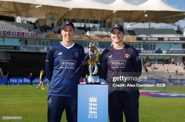 Georgia Adams of Hampshire and Eleanor Threlkeld of Lancashire pose with the Metro Bank One Day Cup Trophy during the Metro Bank One Day Cup Final...