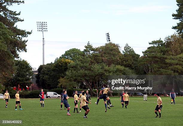 General view as a Sunday league grassroots football game is played on a pitch nearby the stadium prior to the Premier League match between...