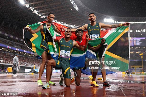 Bronze medalists Lythe Pillay, Zakithi Nene, Udeme Okon and Wayde Van Niekerk of Team South Africa pose for a photo after competing in the Men's...