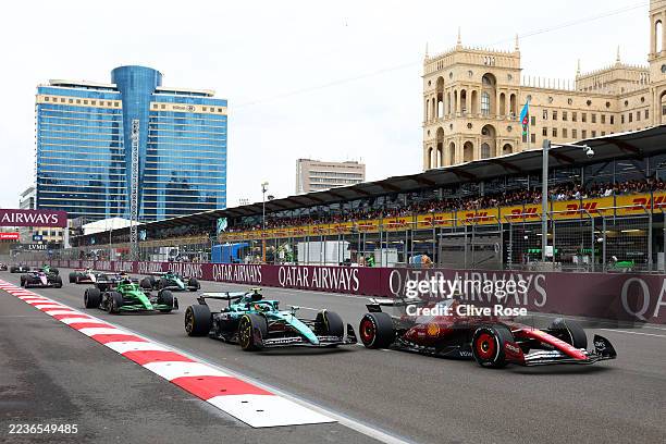 Lewis Hamilton of Great Britain driving the Scuderia Ferrari SF-25 leads Fernando Alonso of Spain driving the Aston Martin F1 Team AMR25 Mercedes on...