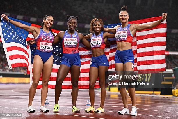 Gold medalists Isabella Whittaker, Lynna Irby-Jackson, Aaliyah Butler and Sydney McLaughlin-Levrone of Team United States pose for a photo with the...