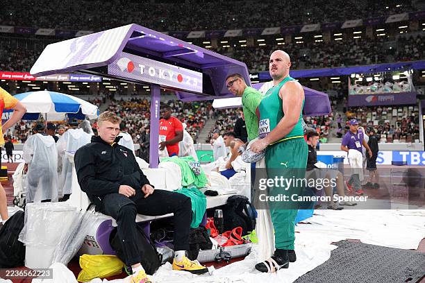 Matthew Denny of Team Australia and Martynas Alekna of Team Lithuania prepare to compete in the Men's Discus Throw Final on day nine of the World...