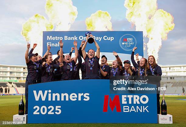 Gaby Lewis of Lancashire lifts the Metro Bank One Day Cup Trophy with teammates after victory in the Metro Bank One Day Cup Final match between...