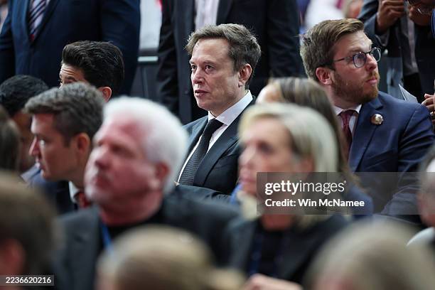Tesla CEO Elon Musk attends the memorial service for political activist Charlie Kirk at State Farm Stadium on September 21, 2025 in Glendale,...