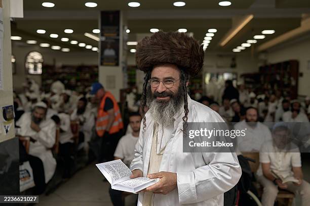 Orthodox Jewish pilgrims pray inside the building housing the tomb of Rabbi Nachman of Breslov during the annual Rosh Hashanah pilgrimage, on...