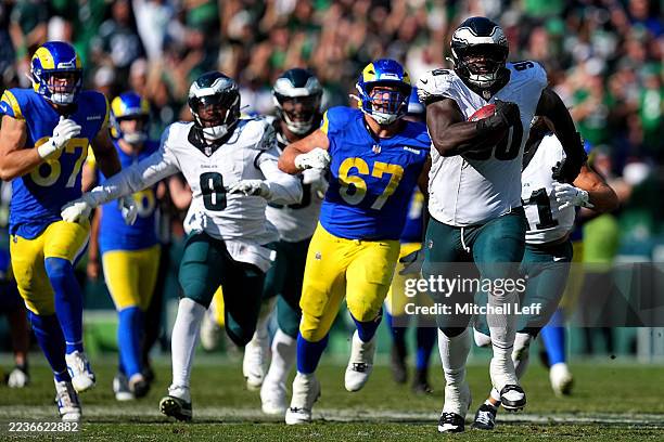 Jordan Davis of the Philadelphia Eagles returns a blocked field goal for a touchdown against the Los Angeles Rams during the fourth quarter at...