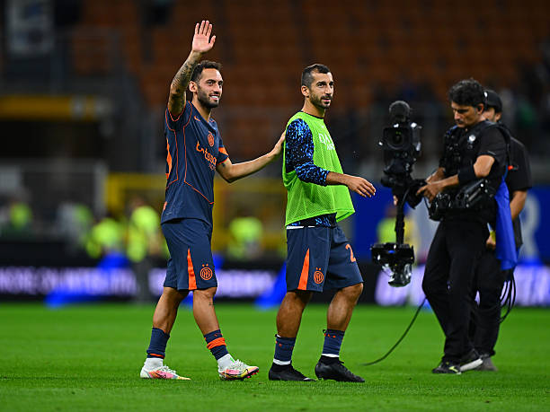 Hakan Calhanoglu and Henrikh Mkhitaryan of FC Internazionale celebrates the win at the end of the Serie A match between FC Internazionale and US...