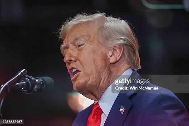 President Donald Trump speaks during the memorial service for political activist Charlie Kirk at State Farm Stadium on September 21, 2025 in...