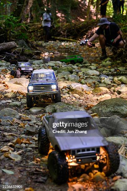 rc car racing on challenging terrain - dried riverbed of a creek - remote control car stock pictures, royalty-free photos & images