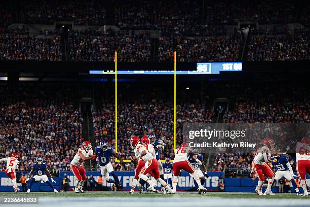 Patrick Mahomes of the Kansas City Chiefs runs with the ball during the game against the New York Giants at MetLife Stadium on September 21, 2025.