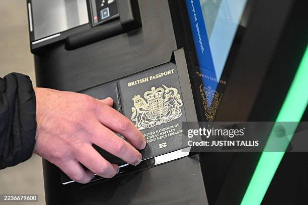 Person as their passport scanned whilst using an Automated European Union Entry/Exit System kiosk during a press preview on the rollout of the EU's...