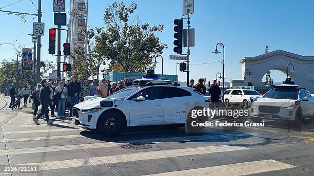 self driving car at fisherman's wharf, san francisco - driverless car stock pictures, royalty-free photos & images