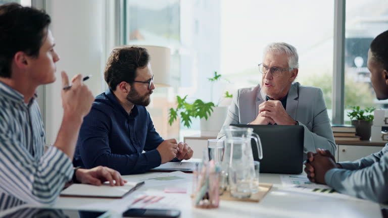 https://media.gettyimages.com/id/2236907282/video/businessmen-meeting-and-documents-with-laptop-in-conference-for-team-planning-or-strategy.jpg?b=1&s=640x640&k=20&c=fEXudDAR5-hoymBkywG4YQylCnt90JUhL5Qt-g4c2ak=