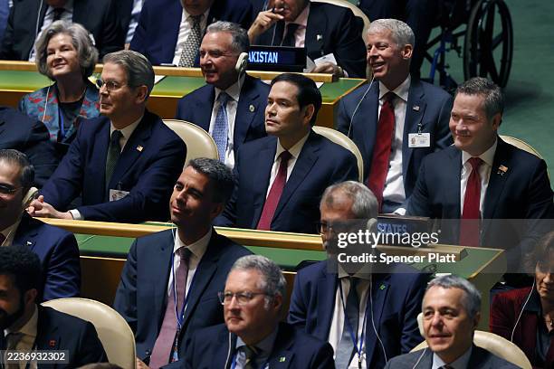 Members of his cabinet, White House Chief of Staff Susie Wiles, U.S. Treasury Secretary Scott Bessent, U.S. Secretary of State Marco Rubio and U.S....