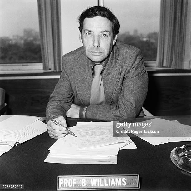 Chairman of the Committee on Obscenity and Film Censorship Professor Bernard Williams, seated at a desk, September 6th 1977.