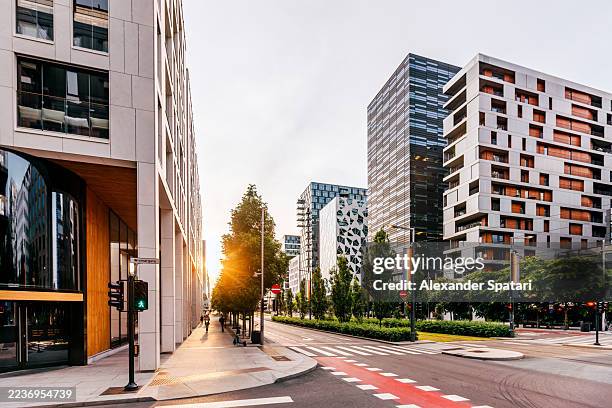 modern office buildings in barcode business district at sunset, oslo, norway - bar code stock pictures, royalty-free photos & images