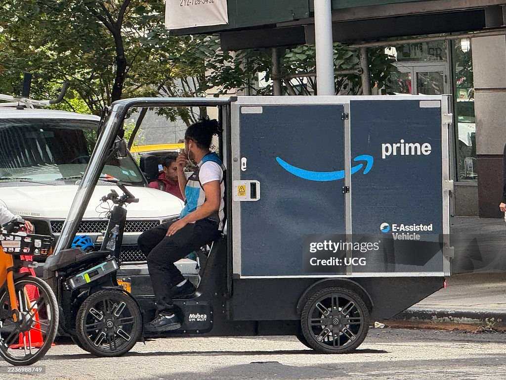 Amazon Delivery Rider Amazon Prime pedicab delivery person on New York City Streets,... News ...
