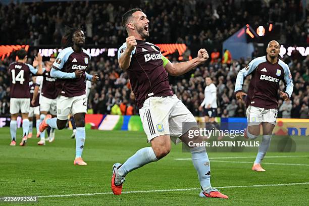 Aston Villa's Scottish midfielder John McGinn celebrates scoring the opening goal during the UEFA Europa League, league stage football match between...