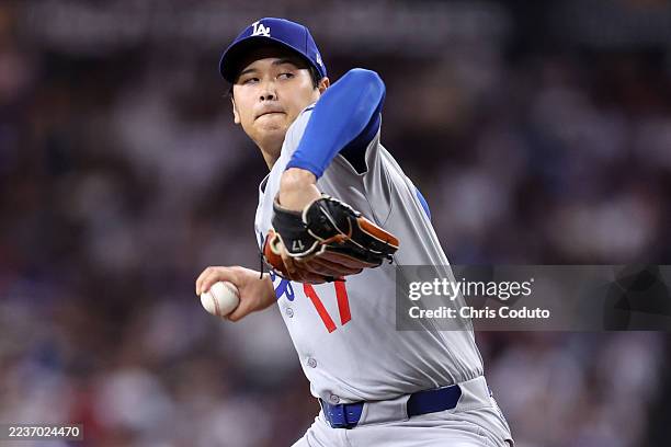 Starter Shohei Ohtani of the Los Angeles Dodgers pitches against the Arizona Diamondbacks during the first inning at Chase Field on September 23,...