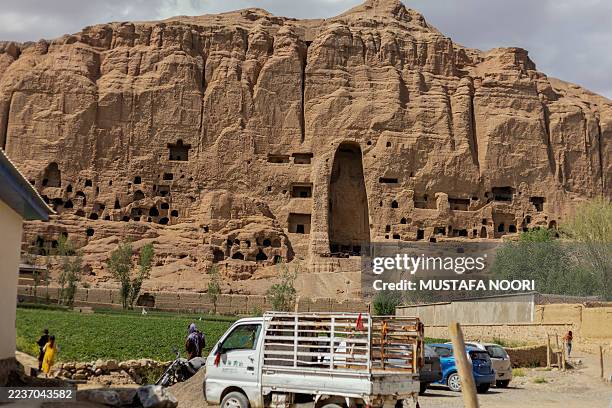 The 38-metre-tall 'Eastern Buddha' statue carved into the cliffs of the Bamiyan Valley, Afghanistan, on June 8 destroyed by the Taliban in March 2001...