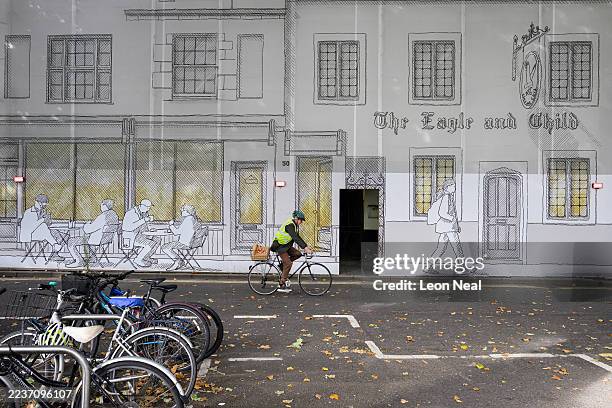 General view of the exterior sheeting surrounding the site of "The Eagle and Child" pub on September 24, 2025 in Oxford, England. Larry Ellison, CEO...