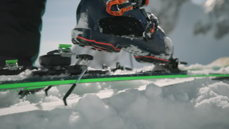 https://media.gettyimages.com/id/2237224257/video/person-securing-ski-touring-boot-on-snowy-mountain-slope.jpg?b=1&s=640x640&k=20&c=QOvyzLE-vvPhiLf3sLosSnl8PoPqS1XuKuH0DBwAtOE=