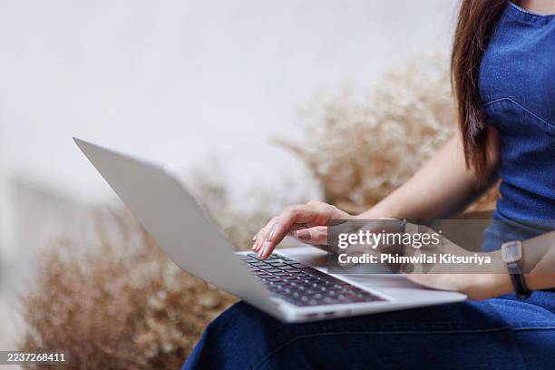 woman's hands typing on laptop at home - data entry keyboard stock pictures, royalty-free photos & images