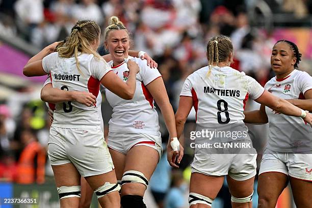 England's Rosie Galligan reacts after winning the the Women's Rugby World Cup final match between Canada and England at The Allianz Stadium,...