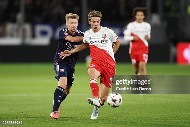 Niklas Vesterlund of FC Utrecht is challenged by Pavel Šulc of Olympique Lyonnais during the UEFA Europa League 2025/26 League Phase MD1 match...