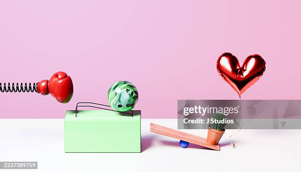 chain reaction of love and fragile emotions - domino effect stock pictures, royalty-free photos & images