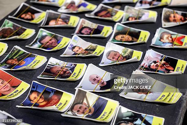 Pictures of Israeli hostages are displayed during an anti-government protest organised by the families of the Israeli hostages taken captive in the...