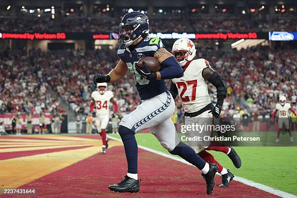 Barner of the Seattle Seahawks scores a receiving touchdown against Akeem Davis-Gaither of the Arizona Cardinals during the first quarter of the game...